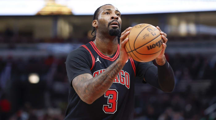 Dec 30, 2023; Chicago, Illinois, USA; Chicago Bulls center Andre Drummond (3) shots a free throw against the Philadelphia 76ers during the first half at United Center. Mandatory Credit: Kamil Krzaczynski-USA TODAY Sports